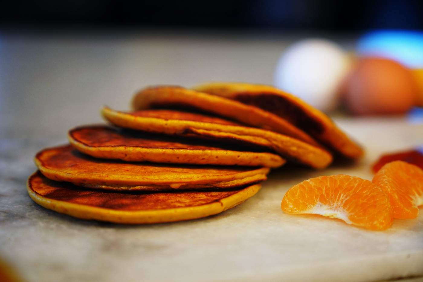 Banana and saffron pancakes with mango and passion jam